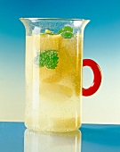 Pineapple and mango punch in glass