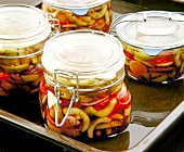 Close-up of boiled vegetables filled in glass jar