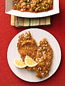 Putenschnitzel mit Erdnusskruste 