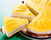 Close-up of orange cake with yoghurt cream on plate