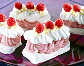 Close-up of meringues filled with raspberry yogurt cream