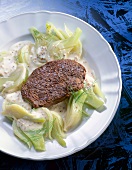 Steak with fennel on dish