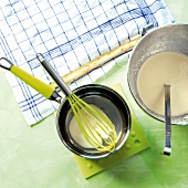 Preparation of sponge roll with lemon cream, overhead view