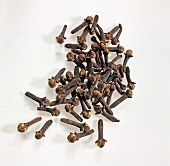 Close-up of dried cloves on white background