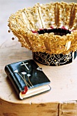 Bible in leather binding and headdress for bride on table, Austria
