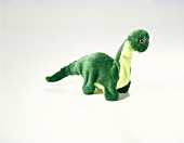 Plüschtier: Dinosaurier grün, - Freisteller.