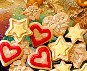 Close-up of almond hearts and star shaped Christmas cookies