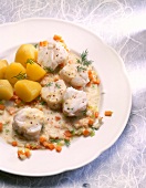 Close-up of fish stew with potatoes and dill in bowl