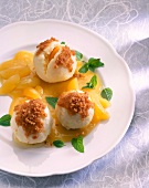 Close-up of apricot and cottage cheese dumplings in dish
