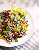 Close-up of rice vegetable stir fried with celery, bacon and peppers