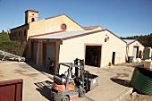 Winery warehouse and forklift at Ashanti Winery, South Africa