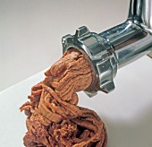 Meat rotated in meat grinder for preparing wild meatballs, step 2