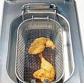 Fried duck legs in frying basket, step 5