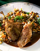 Close-up of wild duck with lentils on plate