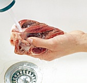 Close-up of heart being washed, step 1