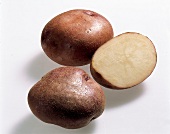 Gemüse aus aller Welt, 2 1/2 hellbraunschalige, ovale Kartoffeln