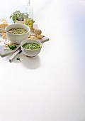 Pesto, salsa verde, garlic and pine nuts on white background