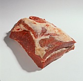 Piece of raw beef meat from breast on white background