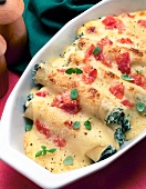 Close-up of cannelloni with ricotta and chard on plate