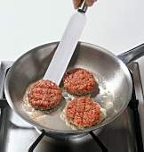 Beef tartare being fried in pan, step 5
