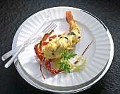 Langusten gratin with paprika sabayon on plate