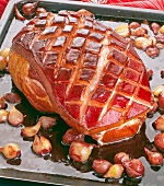 Burgundy pork garnished and shallots on plate