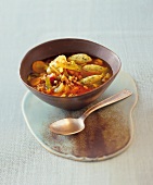 Spelt and vegetable soup in bowl