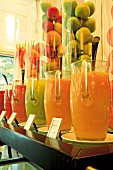 Various fruit juices in glass jars