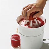 Preparing pomegranate juice from juicer