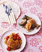 Chicken breast with artichokes and chicken with sherry on plate, Spain