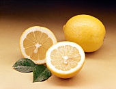 Whole and halved lemon