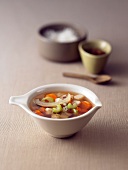 Rice and vegetable soup in cup