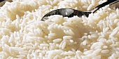 Close-up of rice with spoon