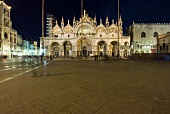 Facade of St Mark's Basilica and square at night, Venice, Italy