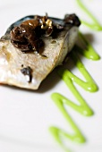 Close-up of mackerel with capers and olives in restaurant Anice Stellato, Venice