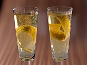 Close-up of two earl grey fizz with lemon peel