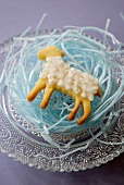 Cookie in the form of lamb with sugar glaze