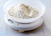 Bowl of flour on measure scale