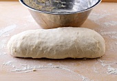 Bread dough rolled in rolling pin shape