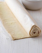 Sweet pastry rolled with paper for preparation of quiches