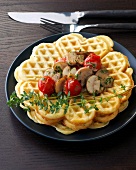 Waffles with mushroom and thyme sauce on plate