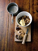 Mixed fruit cubes with butter in bowl