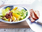 Oranges, duck breast and endive winter salad