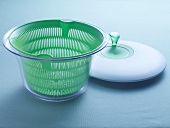 Close-up of salad spinner with strainer and lid