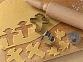 Close-up of cookie dough being cut by cookie melds