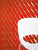 White chair in front of red room divider with curved silts