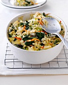 Baked chard pasta in bowl on wire oven rack