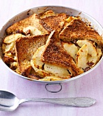 Close-up of pyre bread with potatoes on steel bowl
