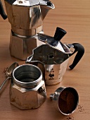Cafeteria pot and accessories on wooden background