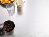 Espresso crush, two glasses and orange slices on white background